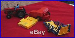 1970's Britains New Holland hay baler+Bale sledge cart, +M F 595 tractor+16 bales