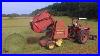 Baling-Hay-With-A-1066-Black-Stripe-And-A-Newholland-644-Round-Baler-01-ecj