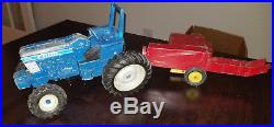 Ertl Ford 7710 116 Die-cast Toy Tractor with Ertl New Holland 116 Hay Baler