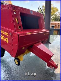 New Holland 664 Round Hay Baler With Bale 1/16 Scale