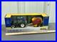 New-Holland-T6-180-and-RB560-Roll-Belt-Baler-DUSTY-CHASE-ERTL-132-NIB-01-hzla