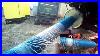 Putting-Net-Wrap-In-The-New-Holland-Baler-01-ac