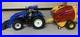 Tomy-Big-Farm-116-New-Holland-T7-270-Tractor-with-Loader-Roll-belt-560-Baler-01-klb
