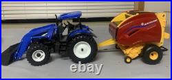Tomy Big Farm 116 New Holland T7.270 Tractor with Loader & Roll-belt 560 Baler Tomy Big Farm 116 New Holland T7.270 Tractor with Loader & Roll-belt 560 Baler
