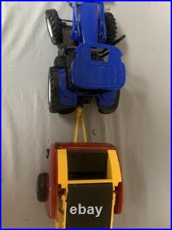 Tomy Big Farm 116 New Holland T7.270 Tractor with Loader & Roll-belt 560 Baler Tomy Big Farm 116 New Holland T7.270 Tractor with Loader & Roll-belt 560 Baler