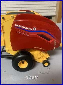 Tomy Big Farm 116 New Holland T7.270 Tractor with Loader & Roll-belt 560 Baler Tomy Big Farm 116 New Holland T7.270 Tractor with Loader & Roll-belt 560 Baler