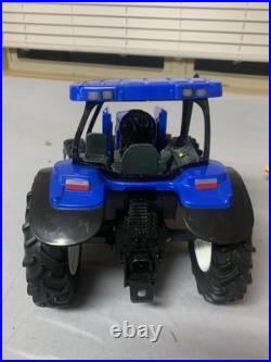 Tomy Big Farm 116 New Holland T7.270 Tractor with Loader & Roll-belt 560 Baler Tomy Big Farm 116 New Holland T7.270 Tractor with Loader & Roll-belt 560 Baler