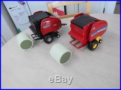 Two Near Mint 1/16 Die Cast Ertl New Holland 560 and Case IH RB 565 Balers
