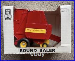 VTG NWT Ford New Holland 660 RedYellow Round Baler 116 Scale Die Cast Model Car