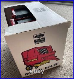 VTG NWT Ford New Holland 660 RedYellow Round Baler 116 Scale Die Cast Model Car