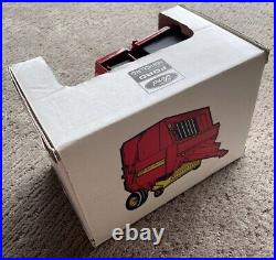 VTG NWT Ford New Holland 660 RedYellow Round Baler 116 Scale Die Cast Model Car