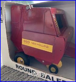 VTG NWT Ford New Holland 660 RedYellow Round Baler 116 Scale Die Cast Model Car